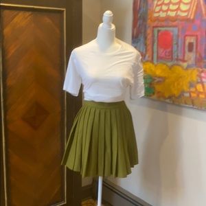 Wool pleated green mini skirt